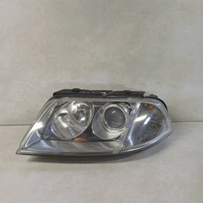 1EL00835001 Proiettore con regolatore altezza SX VOLKSWAGEN PASSAT (3B) 1.6 Ber.