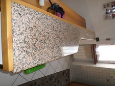 penisola in granito da cucina