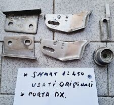 Per Smart 1° mod. 450, minuterie interno porte e tappi fendi argento originali.