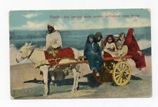 VECCHIA CARTOLINA LIBIA - UNA  FAMIGLIA ARABA AVVIATA DALL'INTERNO VERSO TRIPOLI