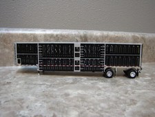 DCP 1/64 Black Wilson asse
