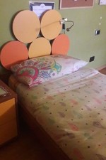 Due strutture letto singolo bambini con testata e giroletto in legno/laminato