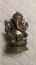 STATUA GANESHA  IN RESINA - ESTERNO IN METALLO  -PESO 1,8 KG  ALTEZZA 23 CM