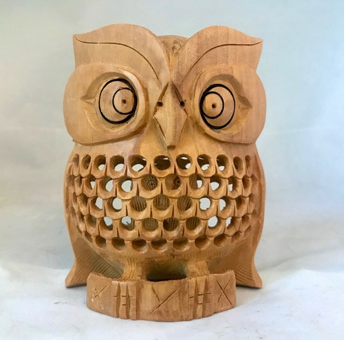 Hand carved wood owl - hand, net
