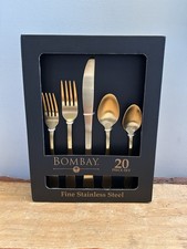 Bombay, tono oro, acciaio