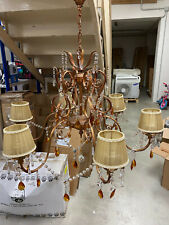 Lampadario salone in ferro battuto ramato con svarosky