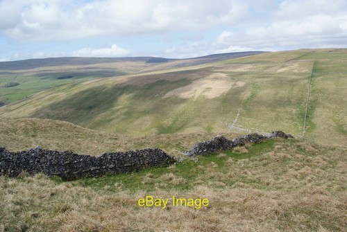 Dry stone wall above - , cowside