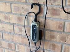 Gancio per appendere a parete