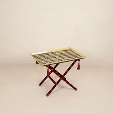 Heraldic tray table by Piero