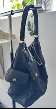 Yves saint laurent - saint, borsa