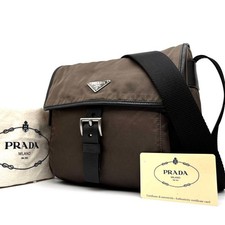 Borsa a tracolla PRADA triangolo logo placca nylon marrone usata uomo originale