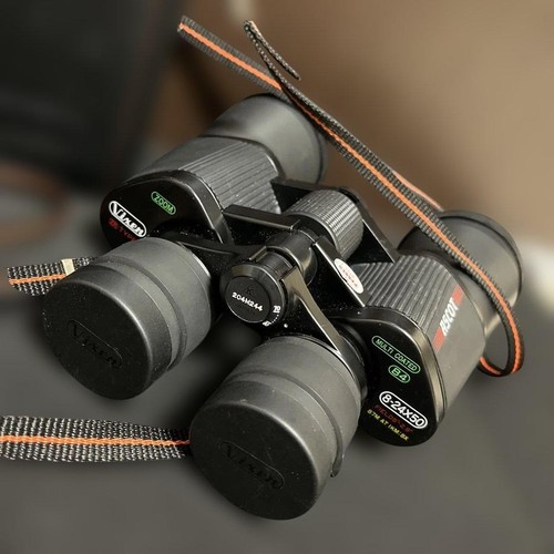 Binocolo zoom multistrato