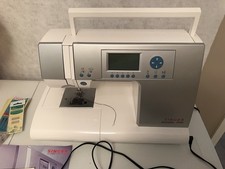 Singer 9940 Quantum con cover