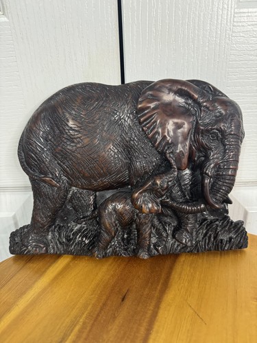 Carved wood elephants wall - wood,