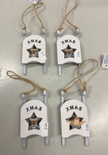 Set di 4 decorazioni in legno