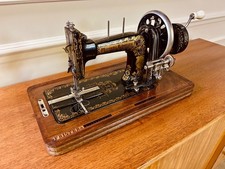 ANTIQUE FRISTER AND ROSSMAN TRANSVERSE SHUTTLE HAND CRANK SEWING MACHINE