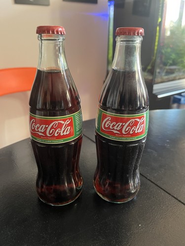 Due bottiglie coca cola - coca,
