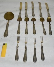 5 coltelli +5 cucchiaini + 4