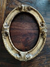 Antica cornice ovale,dorata,in