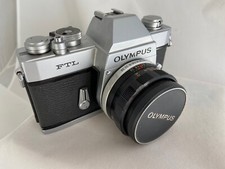 Olympus FTL SLR con 3