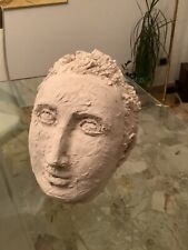 scultura creta bianca volto