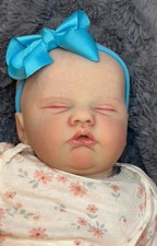 Bambola bambina rinata