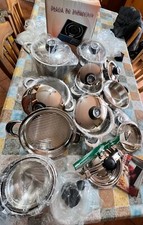 Batteria di pentole completa in acciaio inox con utensili e piastra ad induzione