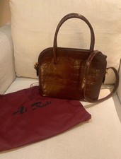 Bellissima borsa realizzata  a mano in pelle stampa coccodrillo 