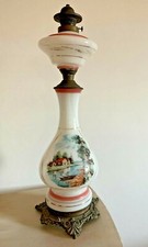 Antico lume ad olio con base