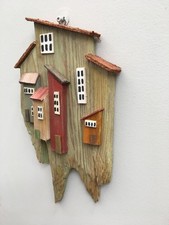 BORGO CASE VERTICALI IN LEGNO