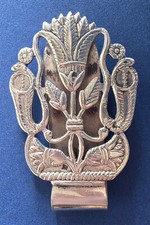 Fermasoldi in argento massiccio (30 gr.) con serpenti e fiori di loto