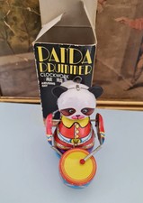 Giocattoli in latta a molla