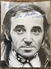 Charles Aznavour autografo su fotografia