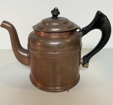 Antica teiera in rame con