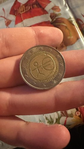 Moneta euro con omino - da,