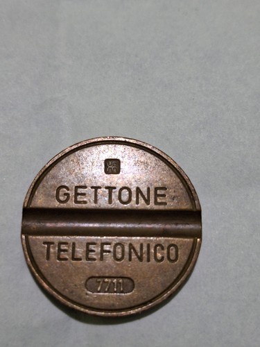 Gettone telefonico 7711 - gettone,