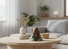 Statua Buddha che ride seduto