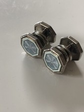 Gemelli a scatto smaltati