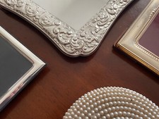 Portafoto lamina argento di varie misure e contenitore tondo