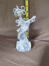 Statua orientale porcellana