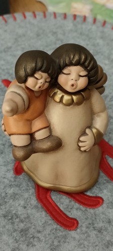 Angelo con bambino - bambino, thun