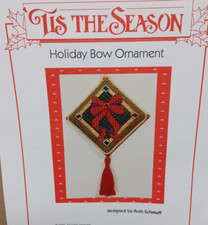 Ornamento con fiocco natalizio di Tis la tabella delle stagioni e abbellimenti