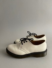 Scarpe Dr. Martens bianche, nuove, mai usate, numero 39. 