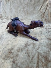 Leather wrapped dromedary - leather,