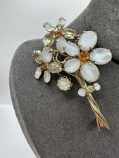 Rara spilla bouquet con steli