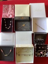 Lotto in argento per bambina: 6 braccialetti, 1 collana + mini orecchini