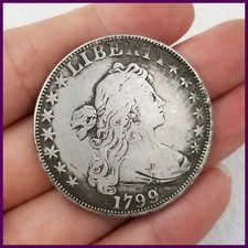 Moneta commemorativa testa e
