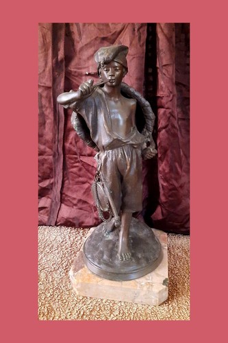 Bronzo contadino con ceste - , su