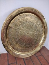 Piatto in ottone decorato a