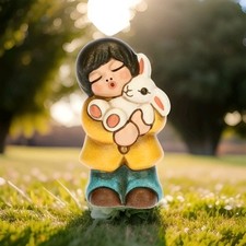 Bambino con coniglio Thun fattoria Country Family